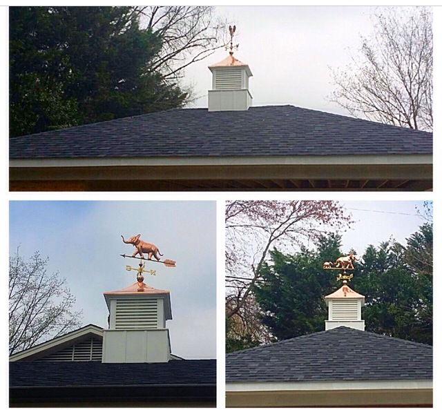 Beautiful new cupolas and weather vanes installed on a new garage roof.